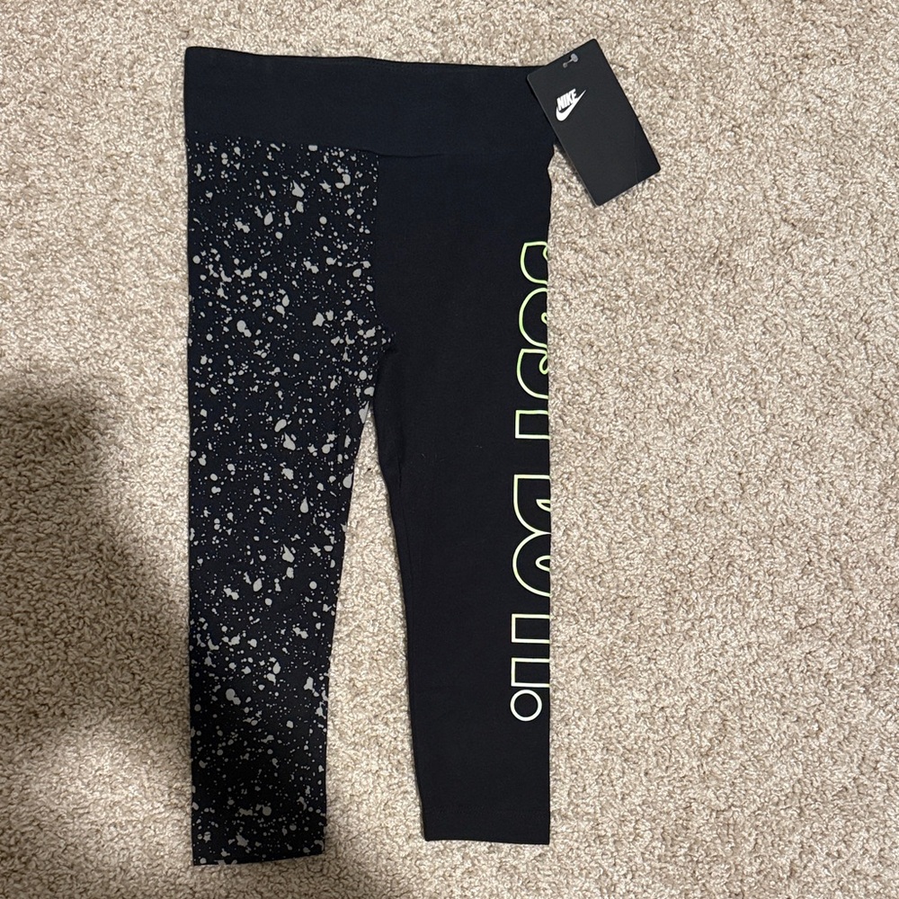 Nike Kids Black Leggings with White Speckles and Neon Green Logo - Picture 1 of 5